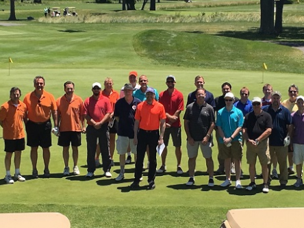 Employees at a golfing event