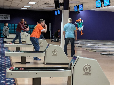 Employees at a bowling event